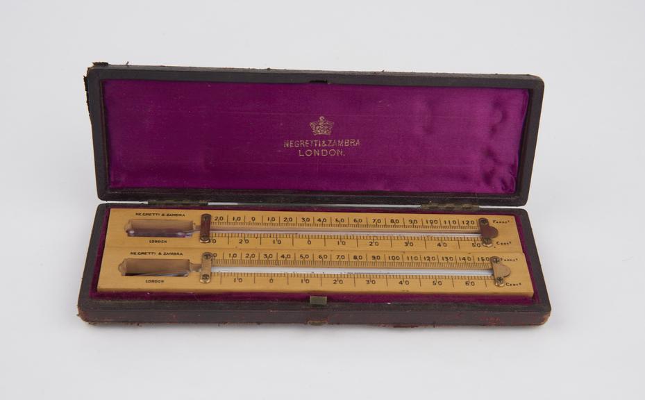 Pair of thermometers, one alcohol-in-glass