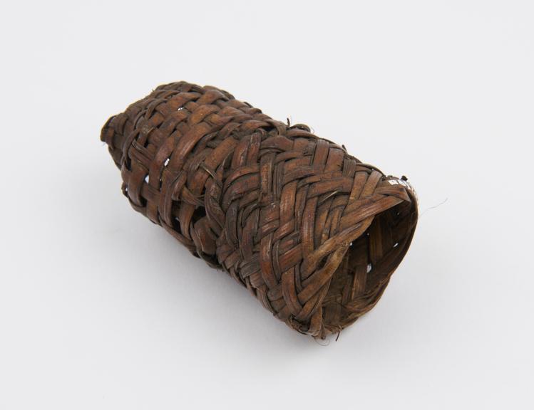 Penis sheath, basket work, from New Guinea, 1871-1910