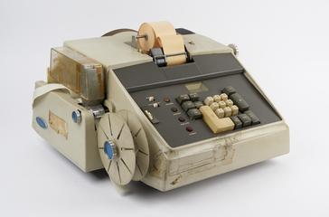 Adding machine/tape punch