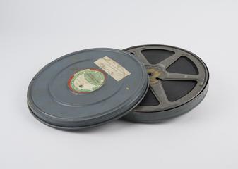 Reel of film in lidded can: 'Introduction to Punch Card Accounting'