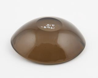 Brown ashtray, made by pressing glass