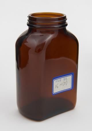 empty brown glass bottle