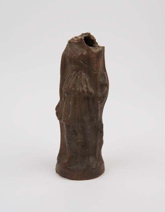 Votive female figure, subject probably lame, terracotta