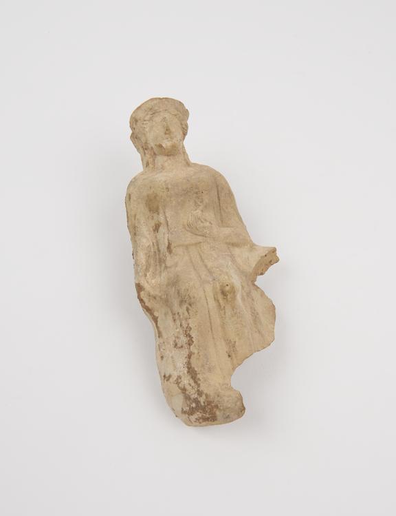 Votive figure of female holding pomegranates