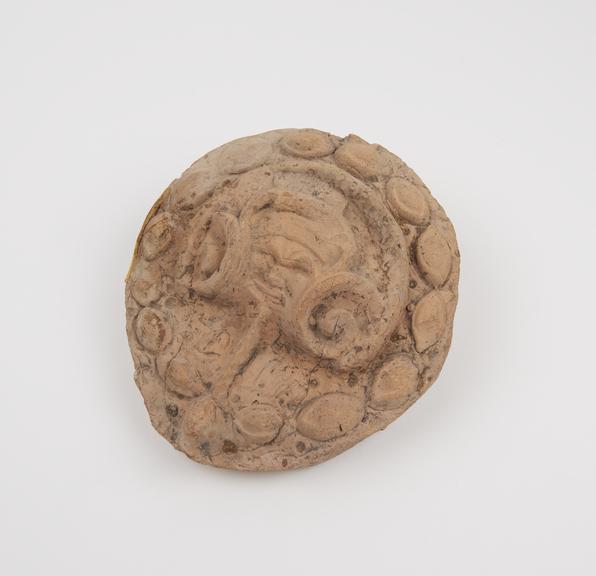 Votive apotropaion plaque, terracotta, probably Roman