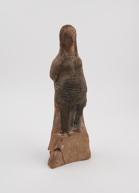 Votive female figure, pregnant, wearing a binder, terracotta