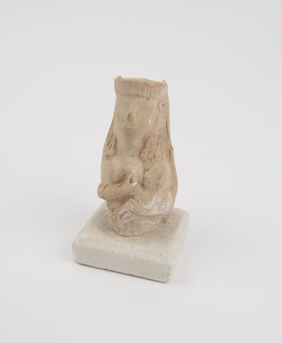 Votive figure of mother suckling infant, terracotta