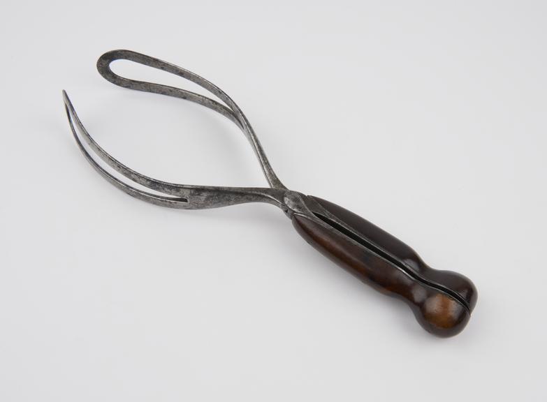 Forceps, obstetrical, possibly Johnson's, steel and mahogany