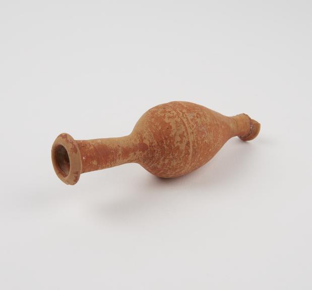 Tear shaped oil flask, earthenware, with darker slip decoration