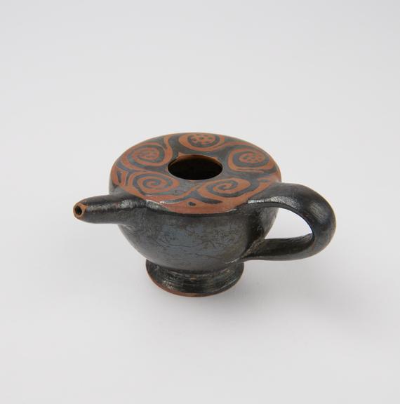 Feeding cup or lamp filler, earthenware, black glaze