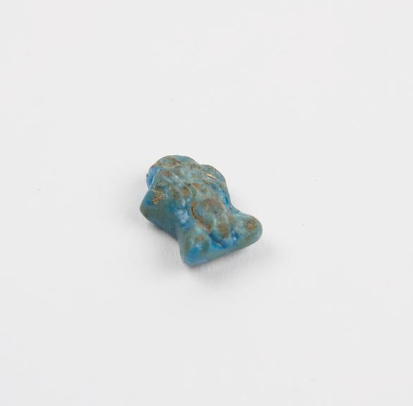 Small amuletic pendant, blue faience in form of male genitalia