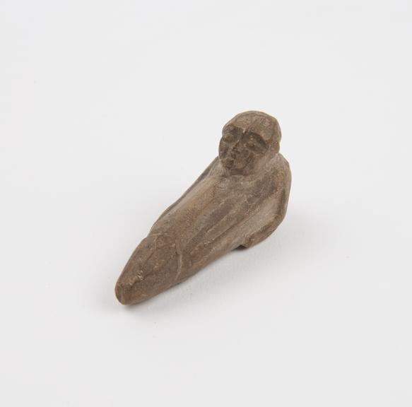 Solid glazed faience phallic figure (amulet)