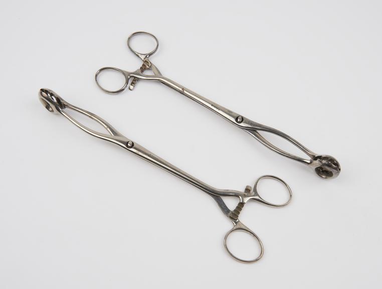 2 pairs of ovarian clamp forceps, nickel plated, by Haran