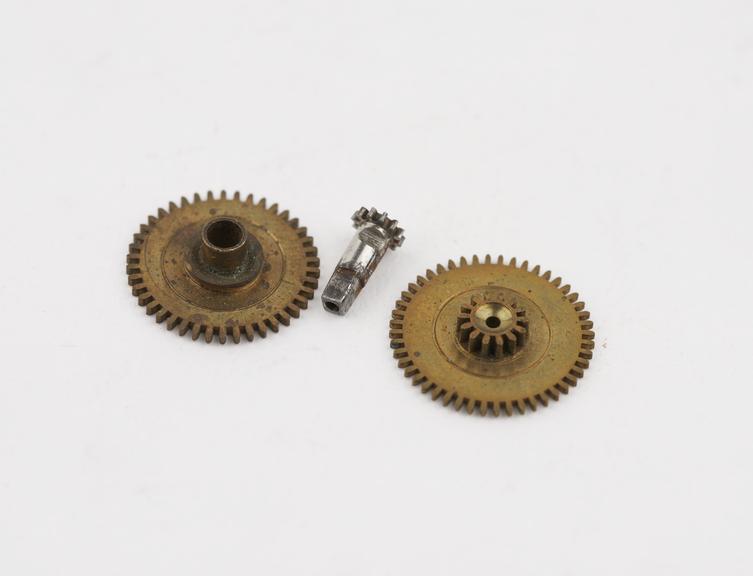 Set of (3) wheels used in motion work of a watch