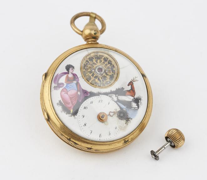 Watch (French or Swiss) with balance wheel visible through a