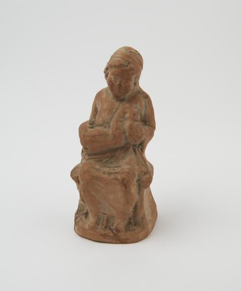 Votive figuring of woman breastfeeding