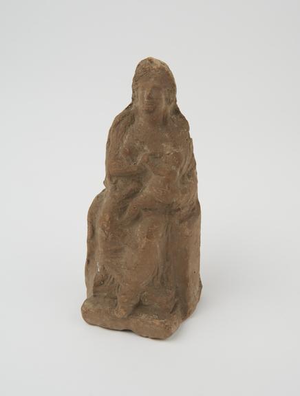 Votive statue of female suckling child, terracotta