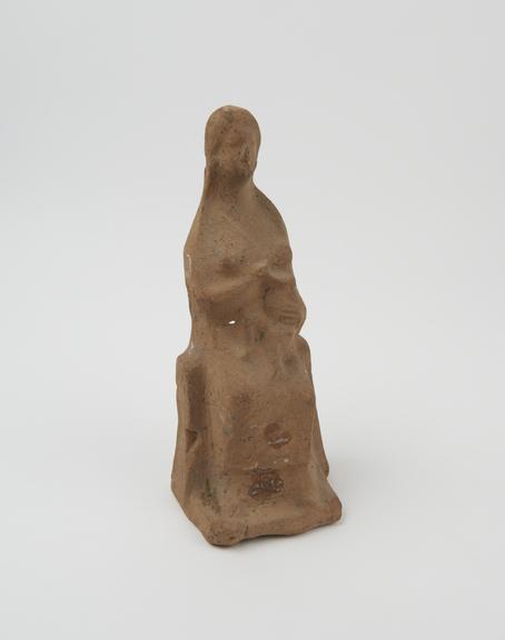 Votive figure of mother suckling infant, terracotta