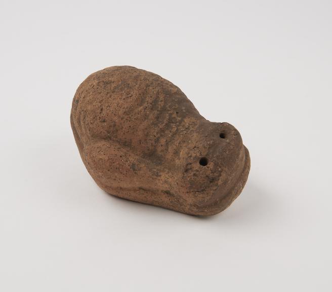 Terracotta votive offering in form of stylised uterus