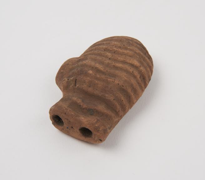 Terracotta votive offering in form of stylised uterus