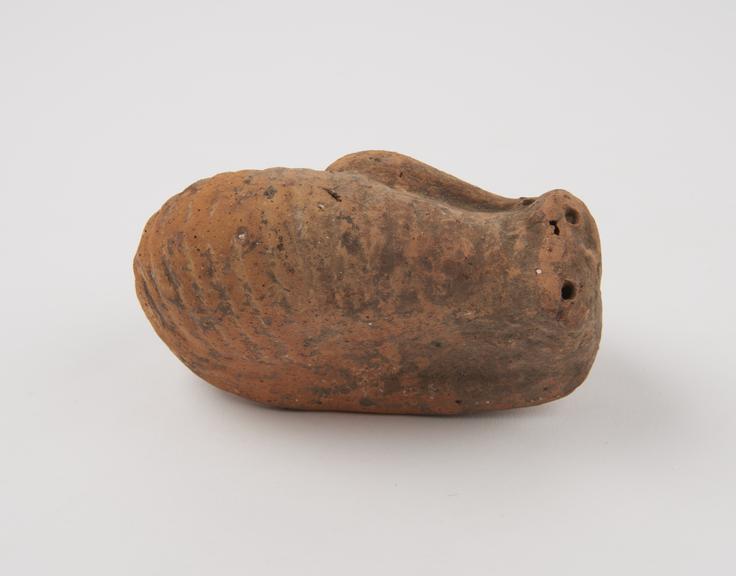 Terracotta votive offering in form of stylised uterus (votive uterus)