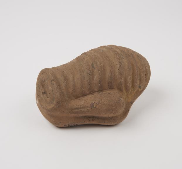 Terracotta votive offering in form of stylised uterus