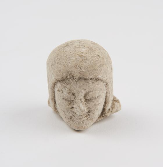 Head, limestone, possibly Etruscan, 700BC to 601BC