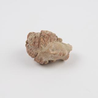 Female head, terracotta, Greek, 250BC to 50BC