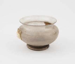 Glass jar, possibly a drug jar