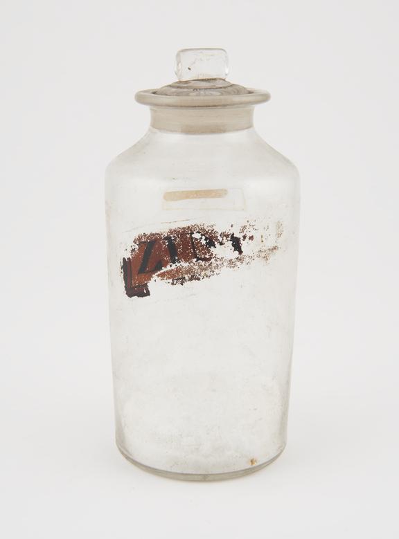 Bottle, clear glass, with contents, for unidentified, zinc salt