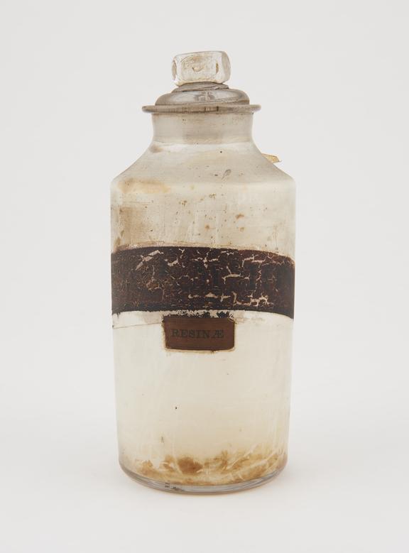 Bottle, clear glass, with contents, for scammony resin