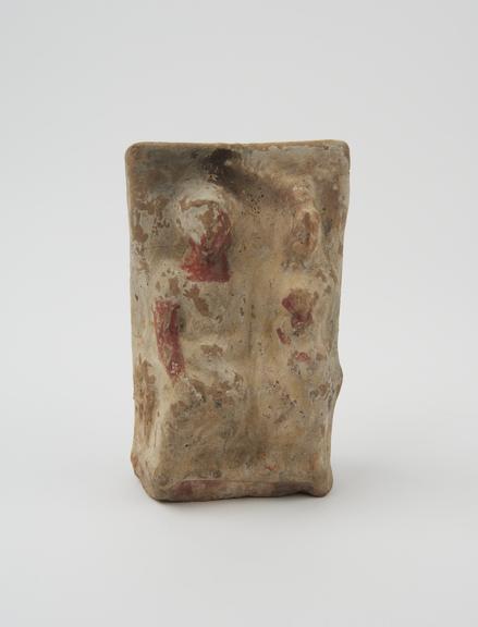 Votive relief of man, woman, and child, terracotta