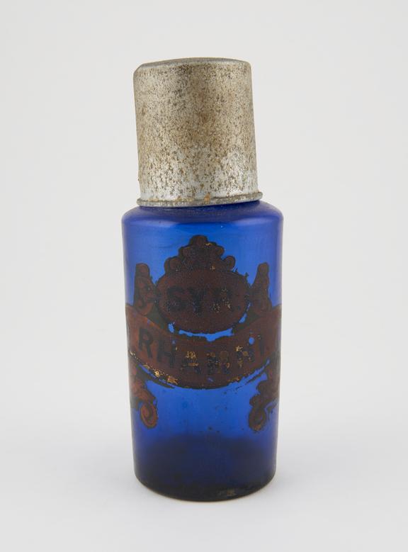 Round syrup bottle, dark blue glass, empty