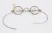 Pair of reading glasses, early 19th century, (1 lens cracked)