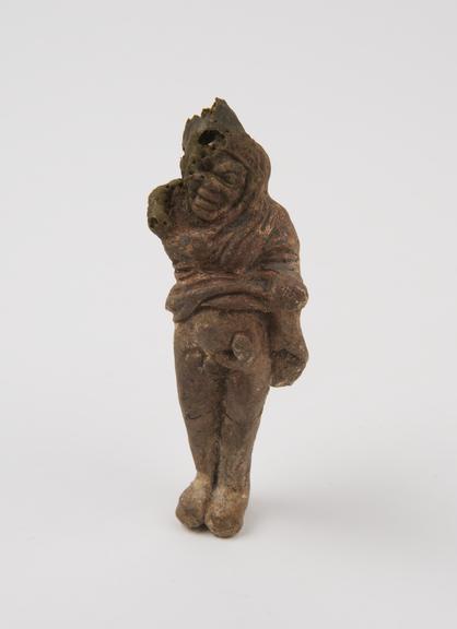 Hollow unglazed terracotta phallic figure