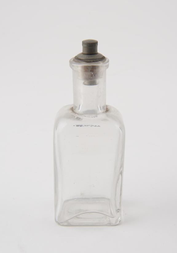 Rectangular glass bottle with cylindrical neck and cork and