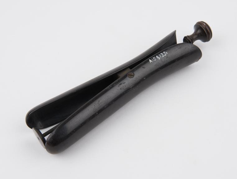 Barnes' tampon introducer, wood and metal, with ebonite blades