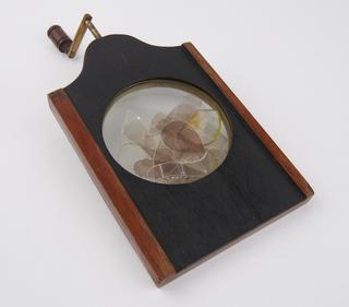 Rotatable slide in wooden frame with turning handle