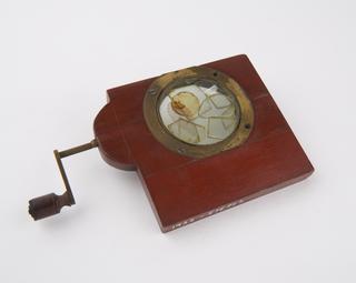 Rotatable slide in wooden frame with turning handle