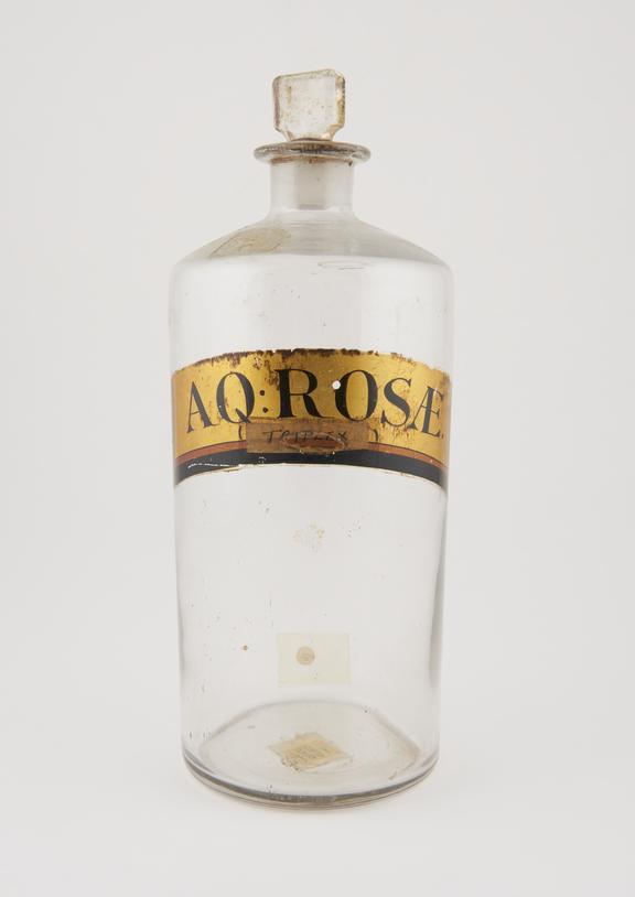 Bottle, clear glass, empty, for rse water, English