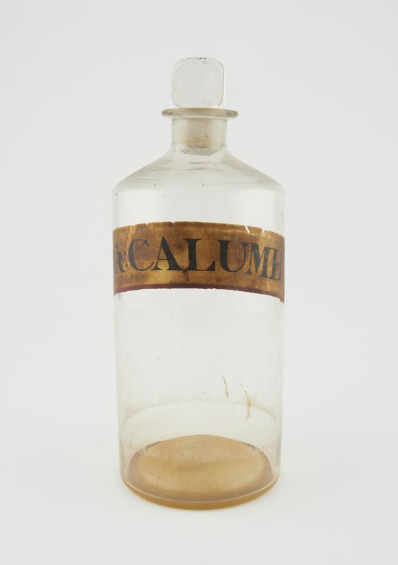 Bottle, clear glass, trace contents, for tincture of calumba