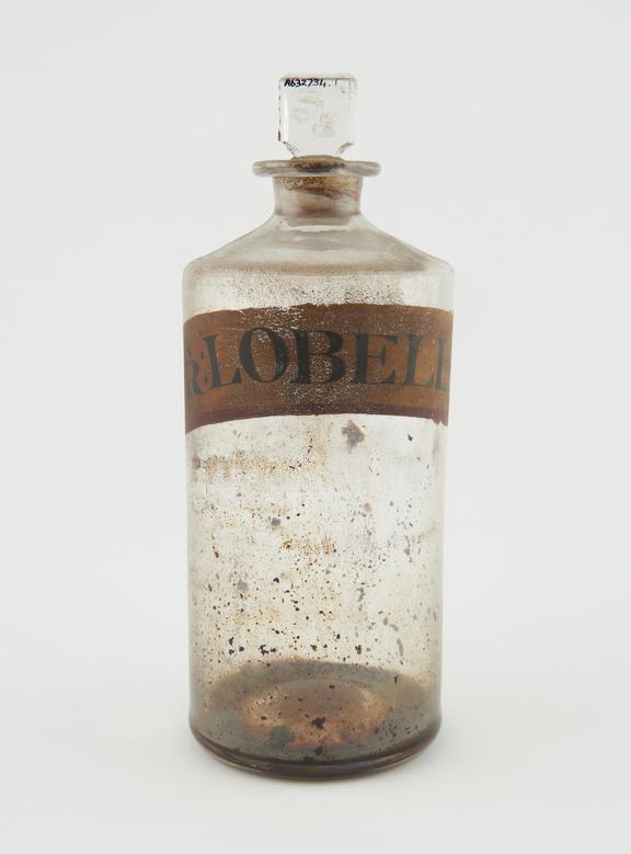 Bottle, clear glass, trace contents, for tincture of lobelia