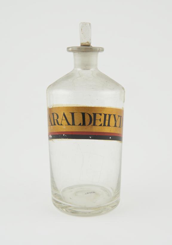 Bottle, clear glass, empty, for paraldehyde, English