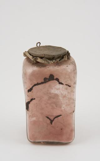 Bottle,clear glass, label worn away