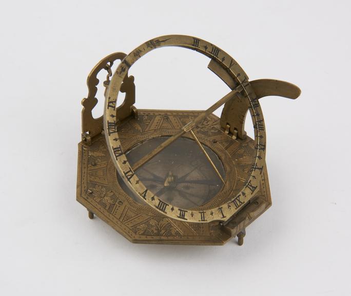 Sun-dial, brass octagonal shape