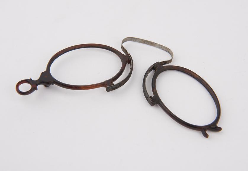 Tortoiseshell folding eyeglasses with bow band spring