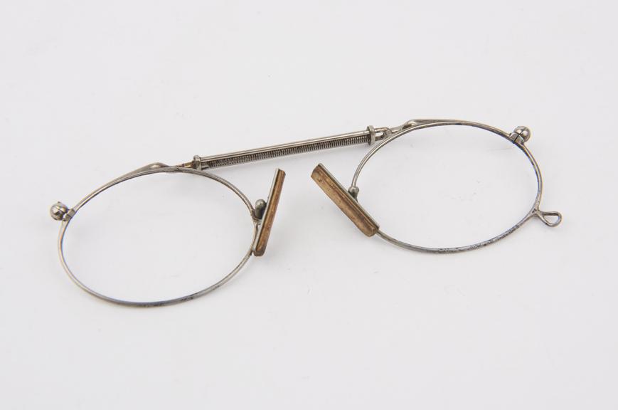 Triple bar horizontal spring clip eyeglass frame with cork (?)