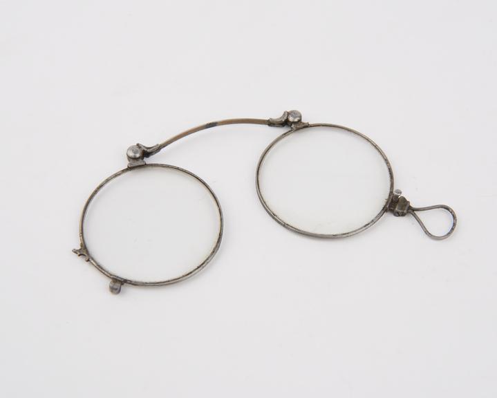 Steel double spring folding eyeglasses with round lenses