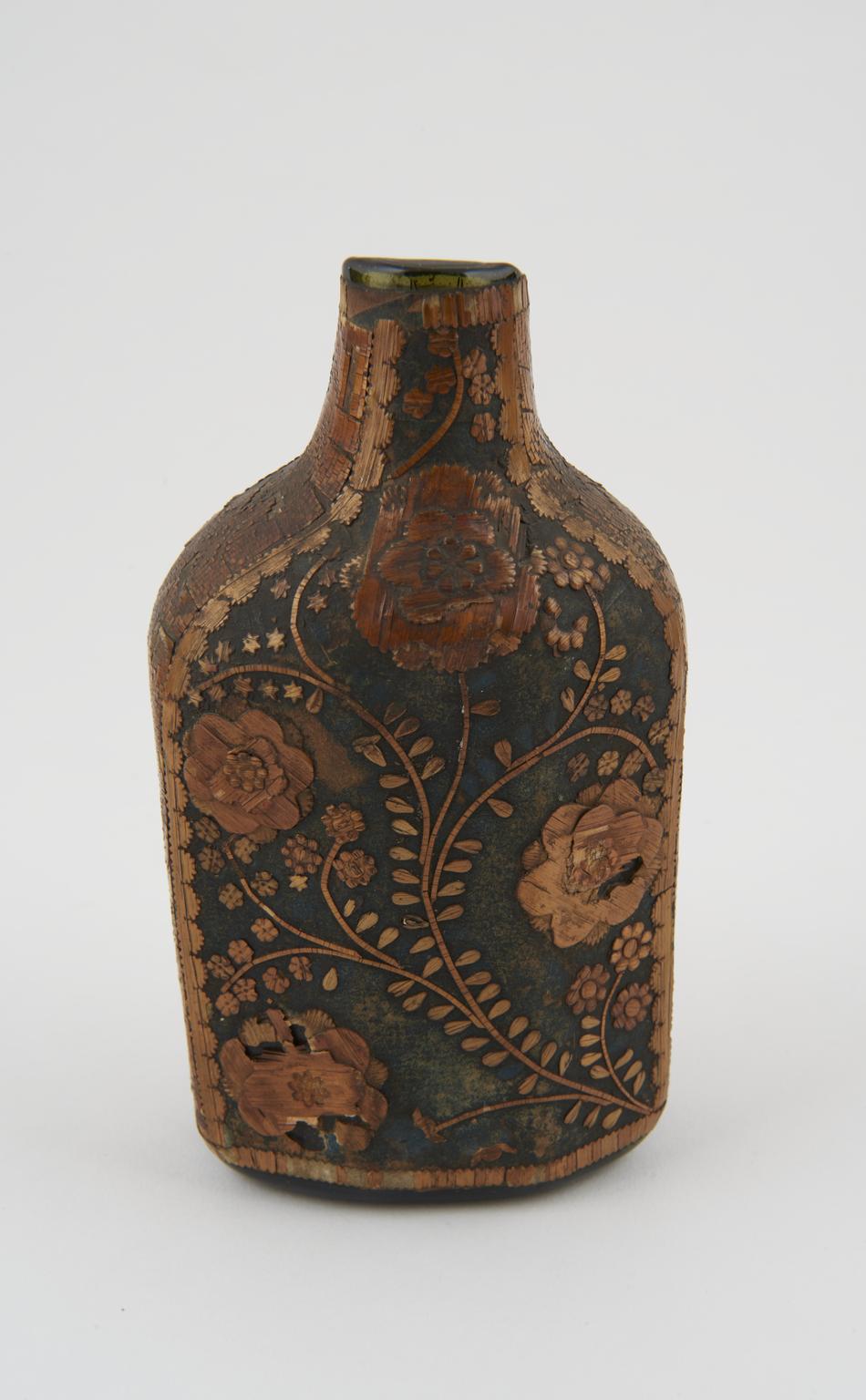 Decorated glass bottle