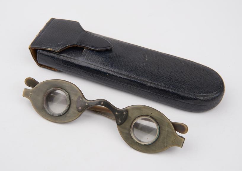 Pair of divering spectacles in black leather slip case